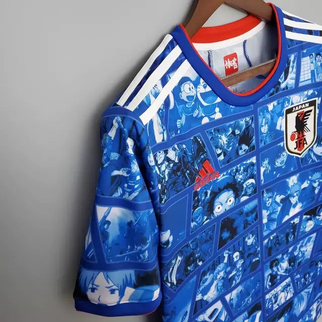 Camisa Japão Edição especial comemorativa 22/23 - Torcedor Adidas Masculina - Azul com detalhes de desenhos em quadrinhos