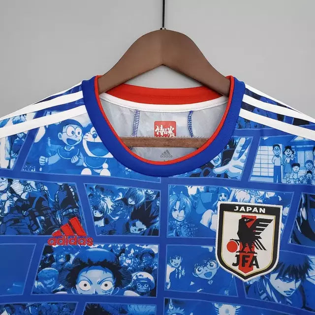 Camisa Japão Edição especial comemorativa 22/23 - Torcedor Adidas Masculina - Azul com detalhes de desenhos em quadrinhos