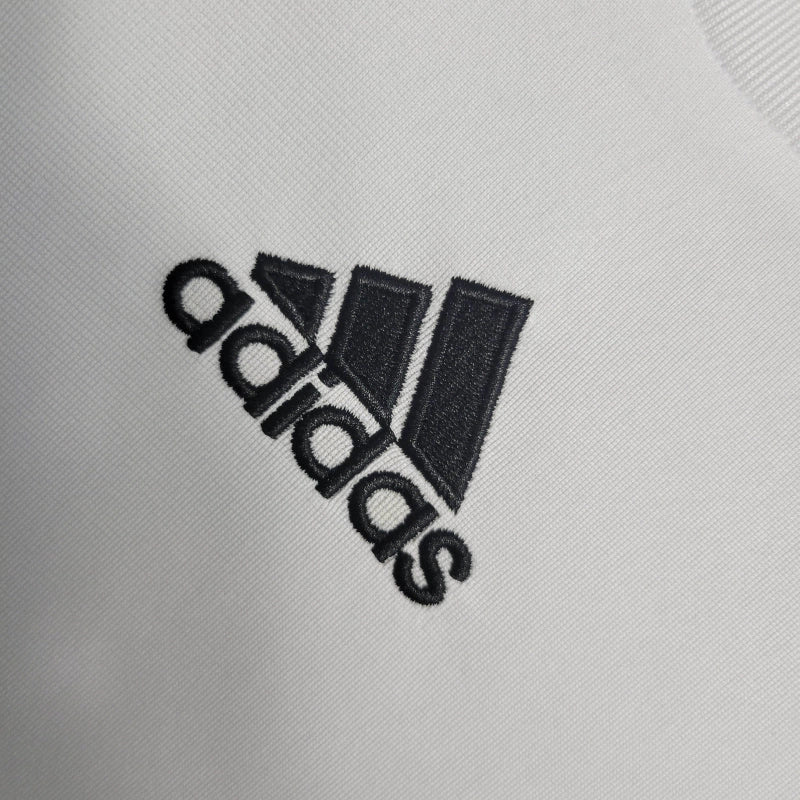 Camisa Retrô Real Madrid I 09/10 manga longa - Masculina Adidas - Branca com detalhes em preto e amarelo