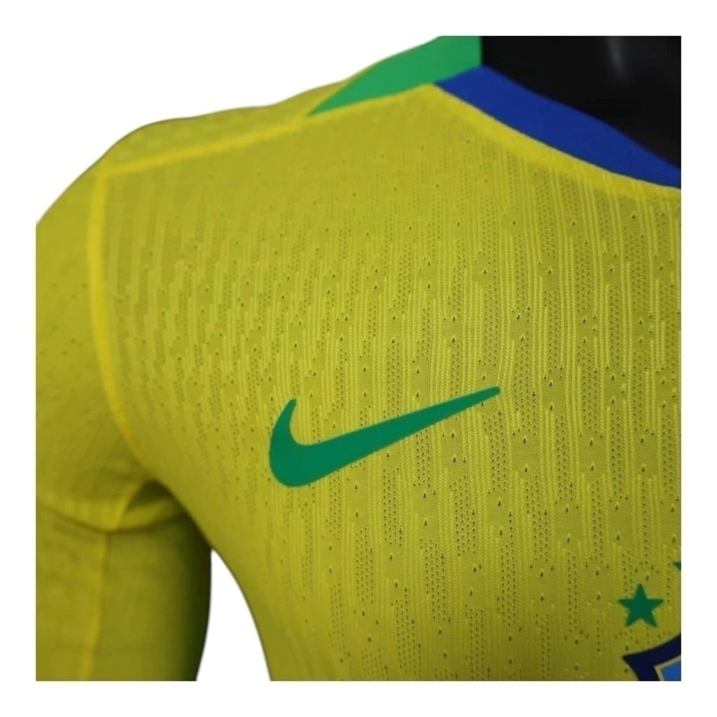 Camisa Seleção Brasileira I 25/26 manga longa - Jogador Nike Masculina - Amarela com detalhes em azul e verde
