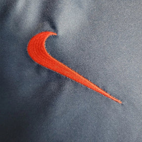 Camisa Paris Saint-Germain I 23/24 manga longa - Torcedor Nike Masculina - Azul com detalhes em vermelho