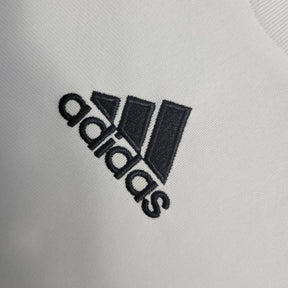Camisa Retrô Real Madrid I 09/10 manga longa - Masculina Adidas - Branca com detalhes em preto e amarelo
