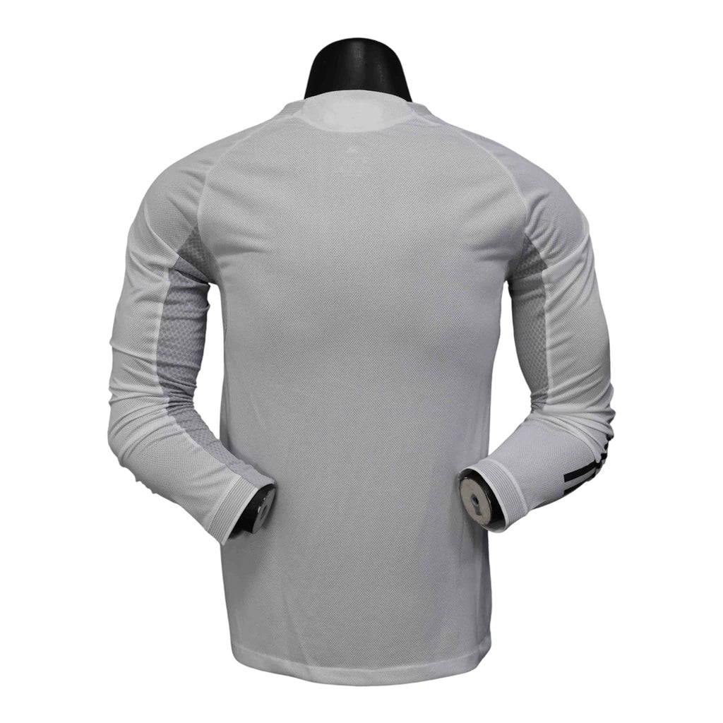 Camisa Real Madrid I 25/26 manga longa - Jogador Adidas Masculina - Branca com detalhes em amarelo