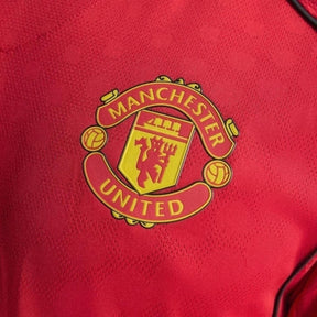 Camisa Manchester United I 25/26 - Torcedor Adidas Feminina - Vermelha com detalhes em preto